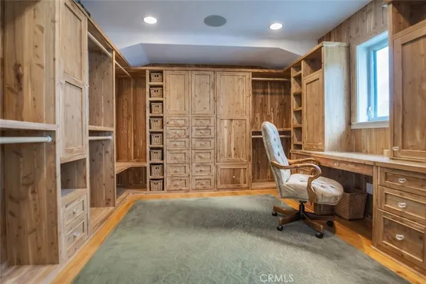 a view of a livingroom with couch and a window