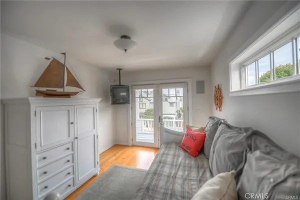 a bedroom with furniture and a bed