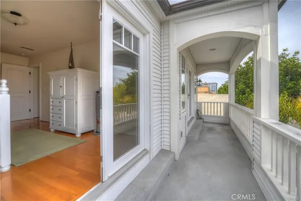 a view of a hallway with a outdoor space