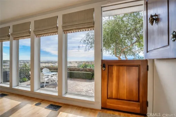 a view of a room that has a large window