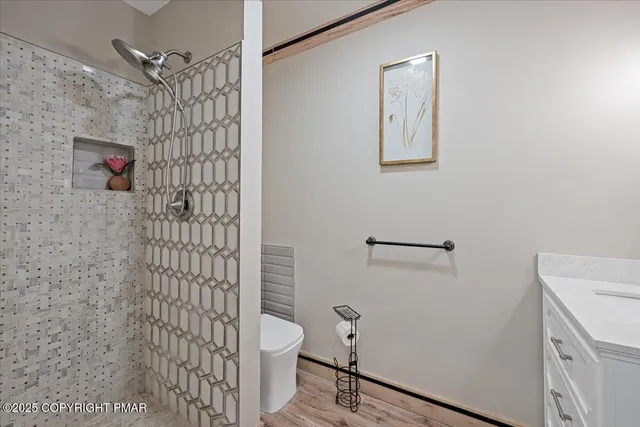 an empty room with wooden floor