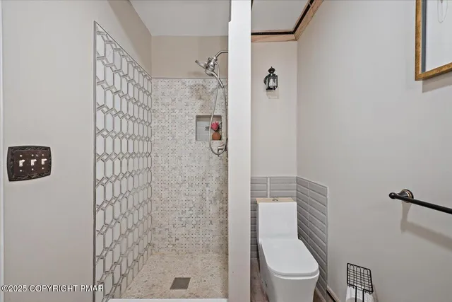 a view of a hallway with washer and dryer