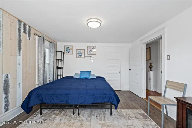 a living room with furniture and white walls