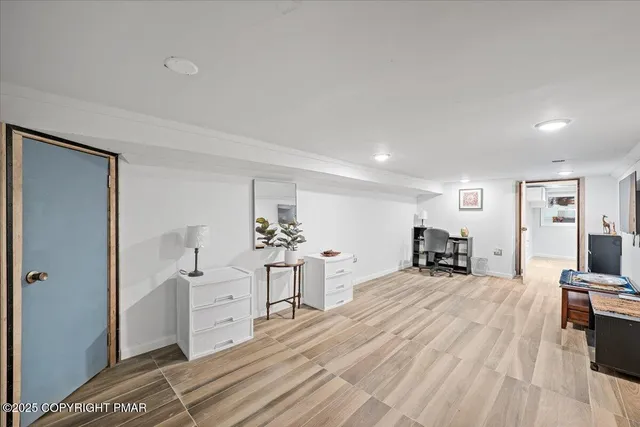 a view of a patio with table and chairs