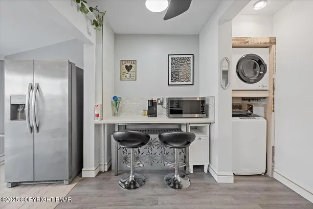 a bathroom with a shower and a toilet