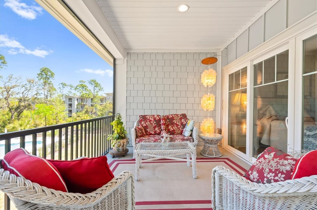 39 Harbor Road Jekyll Island, GA 31527 - Photo 37 of 56 The top floor screened porch sitting area