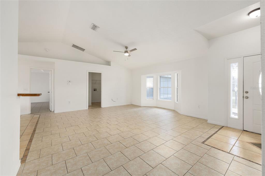 15434 Southwest 23rd Court Road Ocala, FL 34473 - Photo 8 of 41 a view of an empty room with a bathroom