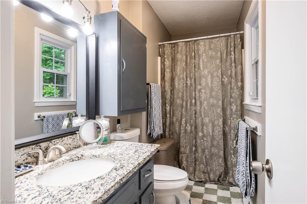 216 Brookwood Drive Elkin, NC 28621 - Photo 13 of 22 Primary bathroom
