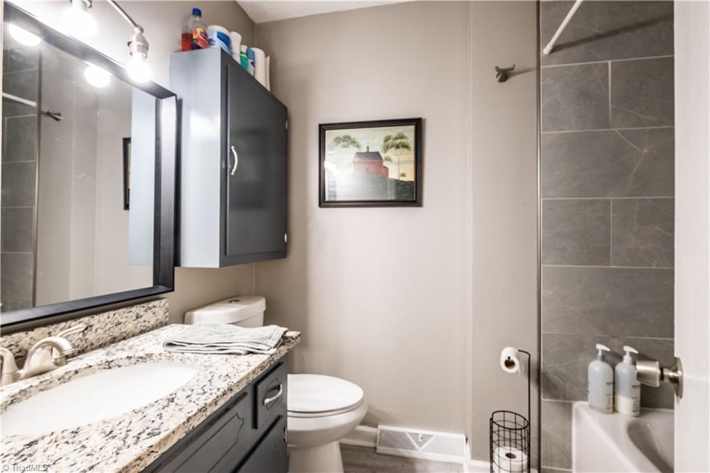 216 Brookwood Drive Elkin, NC 28621 - Photo 15 of 22 Second full bath located on hallway