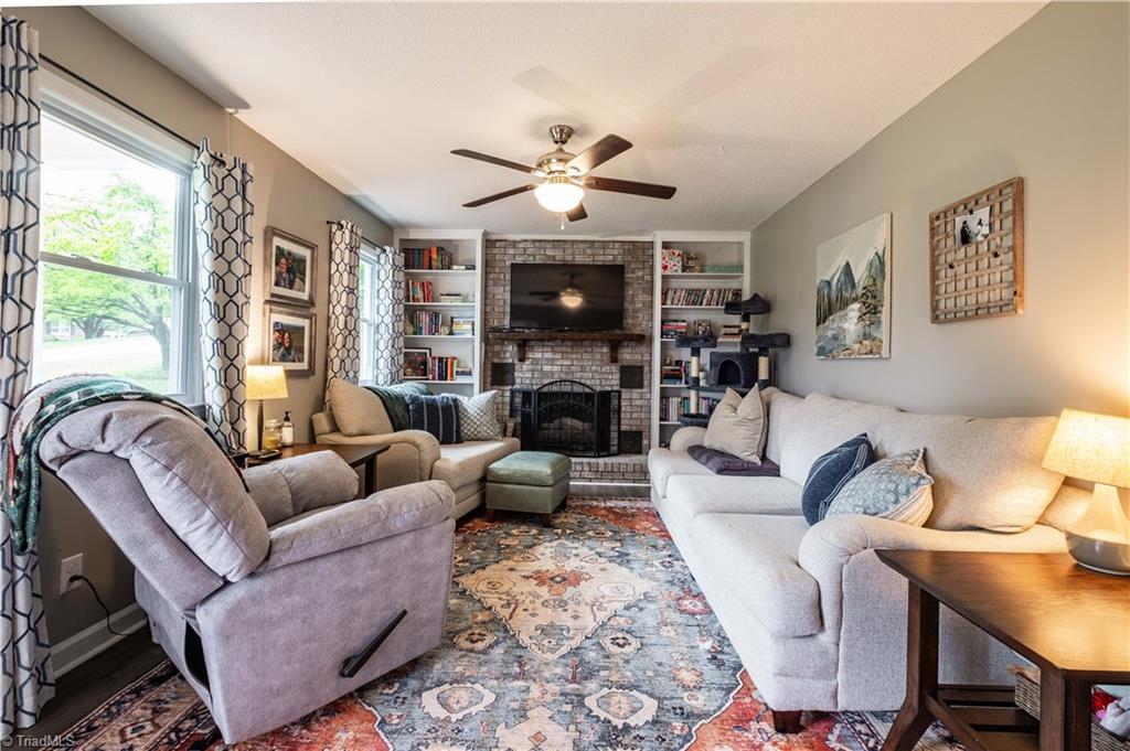 216 Brookwood Drive Elkin, NC 28621 - Photo 5 of 22 Den with fireplace