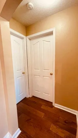 a kitchen with stainless steel appliances granite countertop a stove and a refrigerator