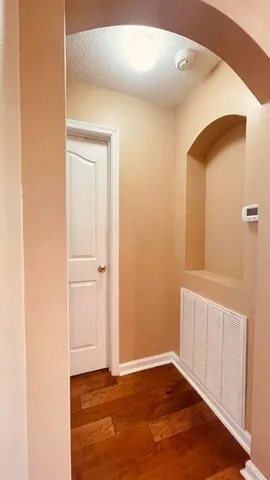 a kitchen with a sink and refrigerator