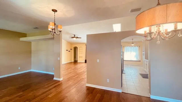 a utility room with cabinets washer and dryer