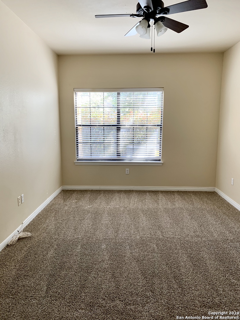 6160 Eckhert Road, Unit 505 San Antonio, TX 78240 - Photo 18 of 36 an empty room with a window