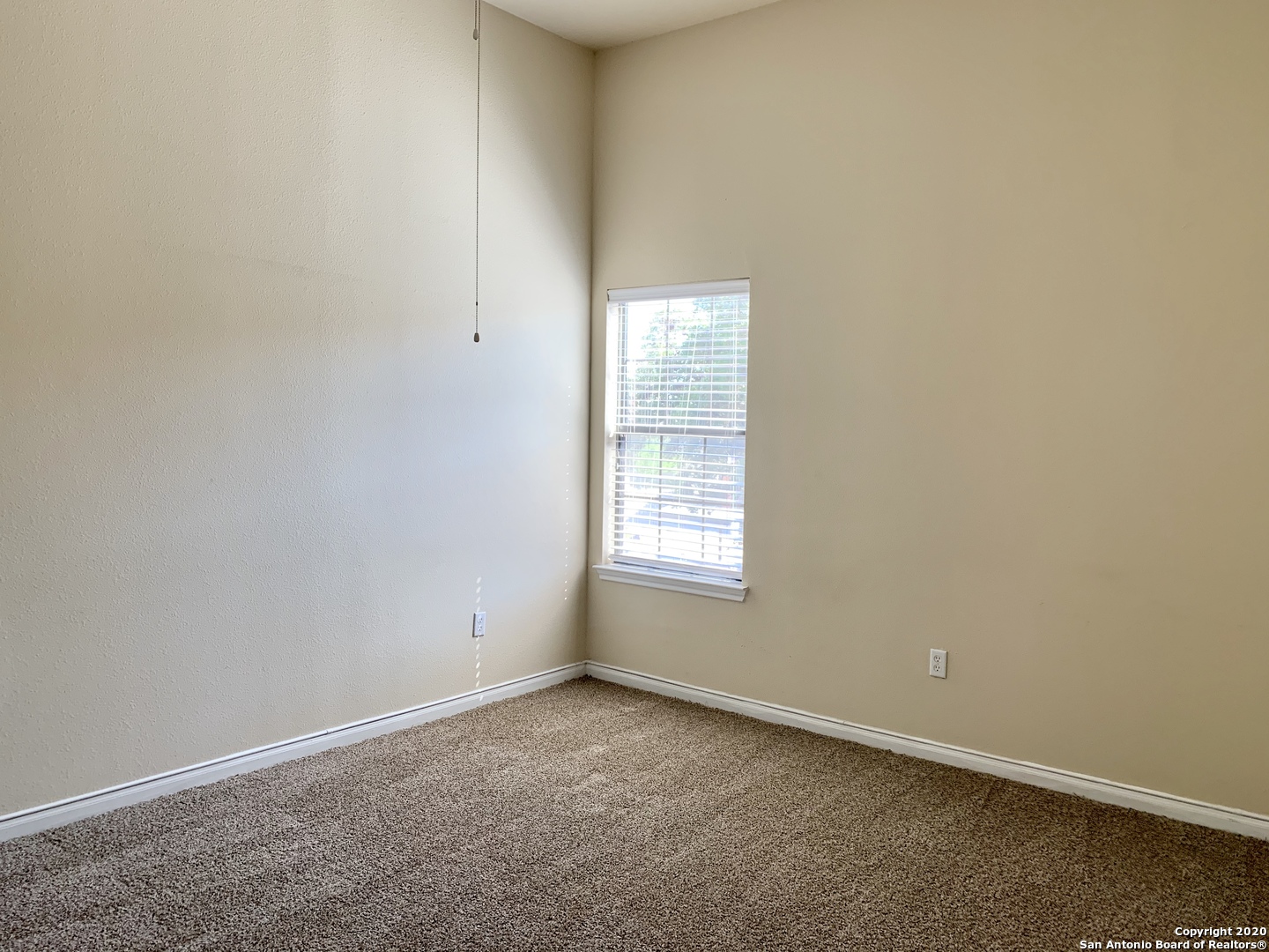 6160 Eckhert Road, Unit 505 San Antonio, TX 78240 - Photo 25 of 36 an empty room with a window