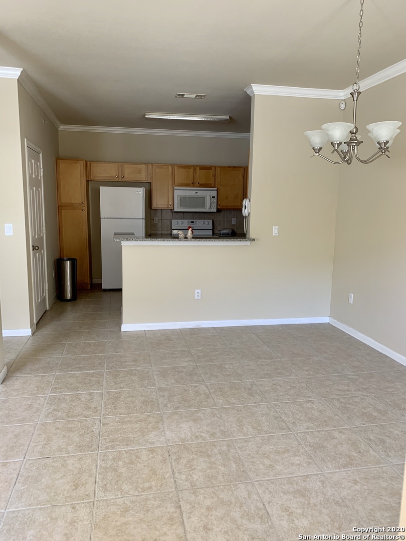 6160 Eckhert Road, Unit 505 San Antonio, TX 78240 - Photo 28 of 36 a view of a livingroom with furniture and a window