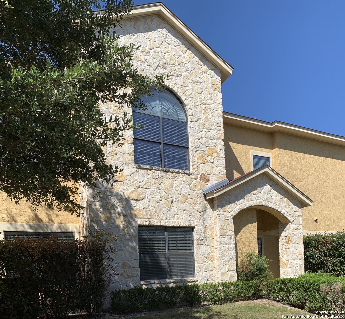 6160 Eckhert Road, Unit 505 San Antonio, TX 78240 - Photo 30 of 36 a front view of a house with yard