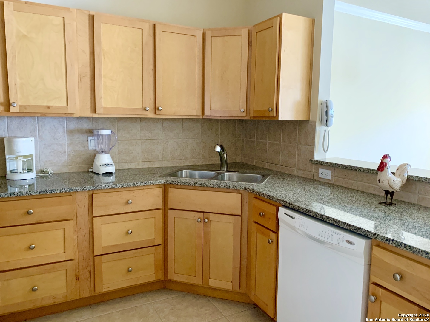 6160 Eckhert Road, Unit 505 San Antonio, TX 78240 - Photo 6 of 36 a kitchen with stainless steel appliances granite countertop white cabinets sink and dishwasher