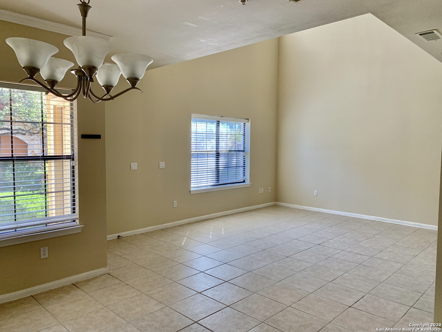 6160 Eckhert Road, Unit 505 San Antonio, TX 78240 - Photo 8 of 36 a view of an empty room with windows