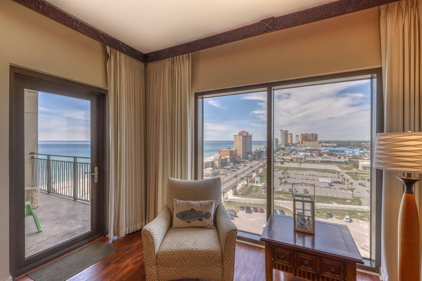 15100 Front Beach Road, Unit 1107 Panama City Beach, FL 32413 - Photo 9 of 24 a view of a dining room with furniture and a window