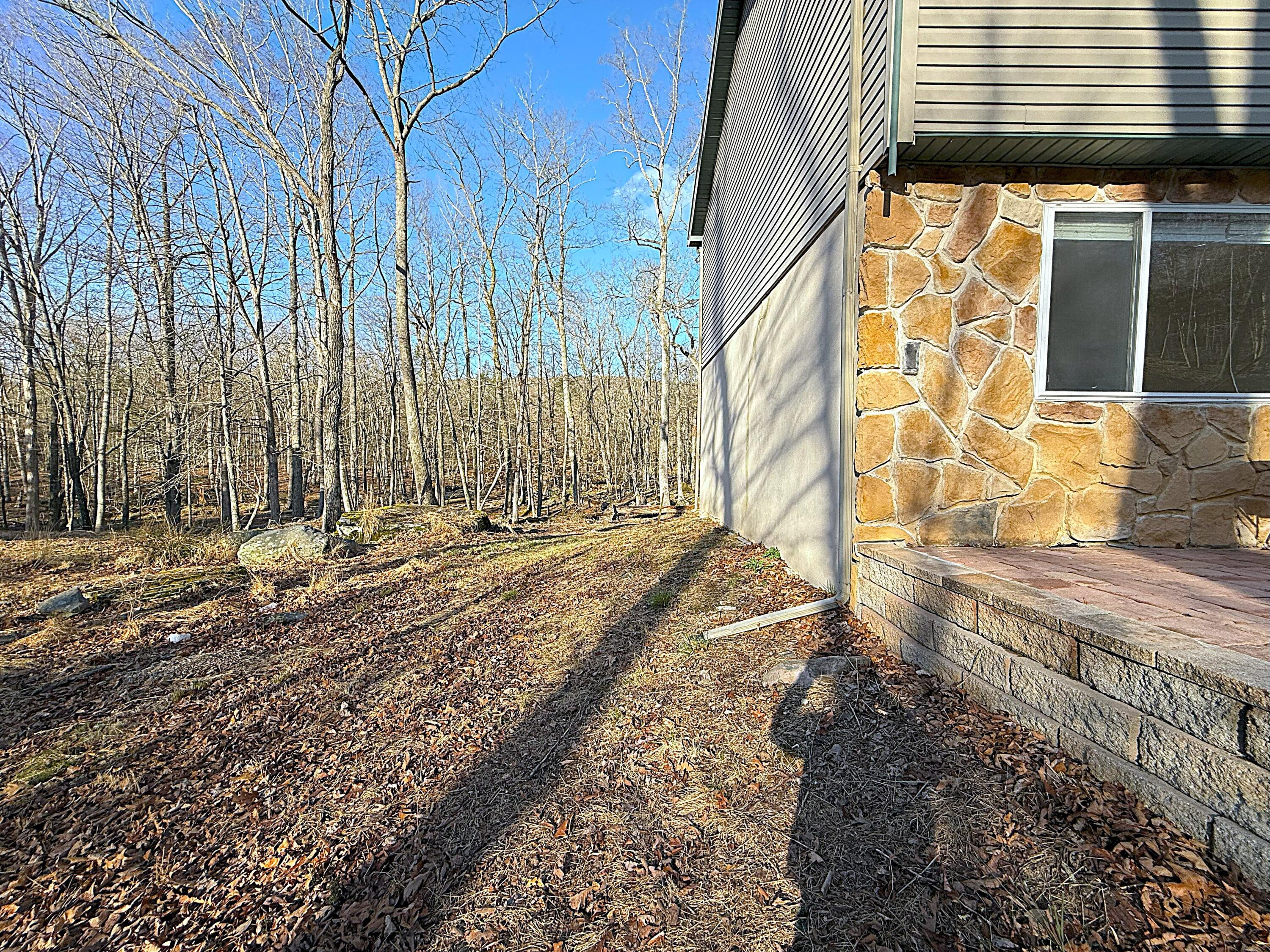 6486 Decker Road Bushkill, PA 18324 - Photo 2 of 53 a view of a back yard of the house