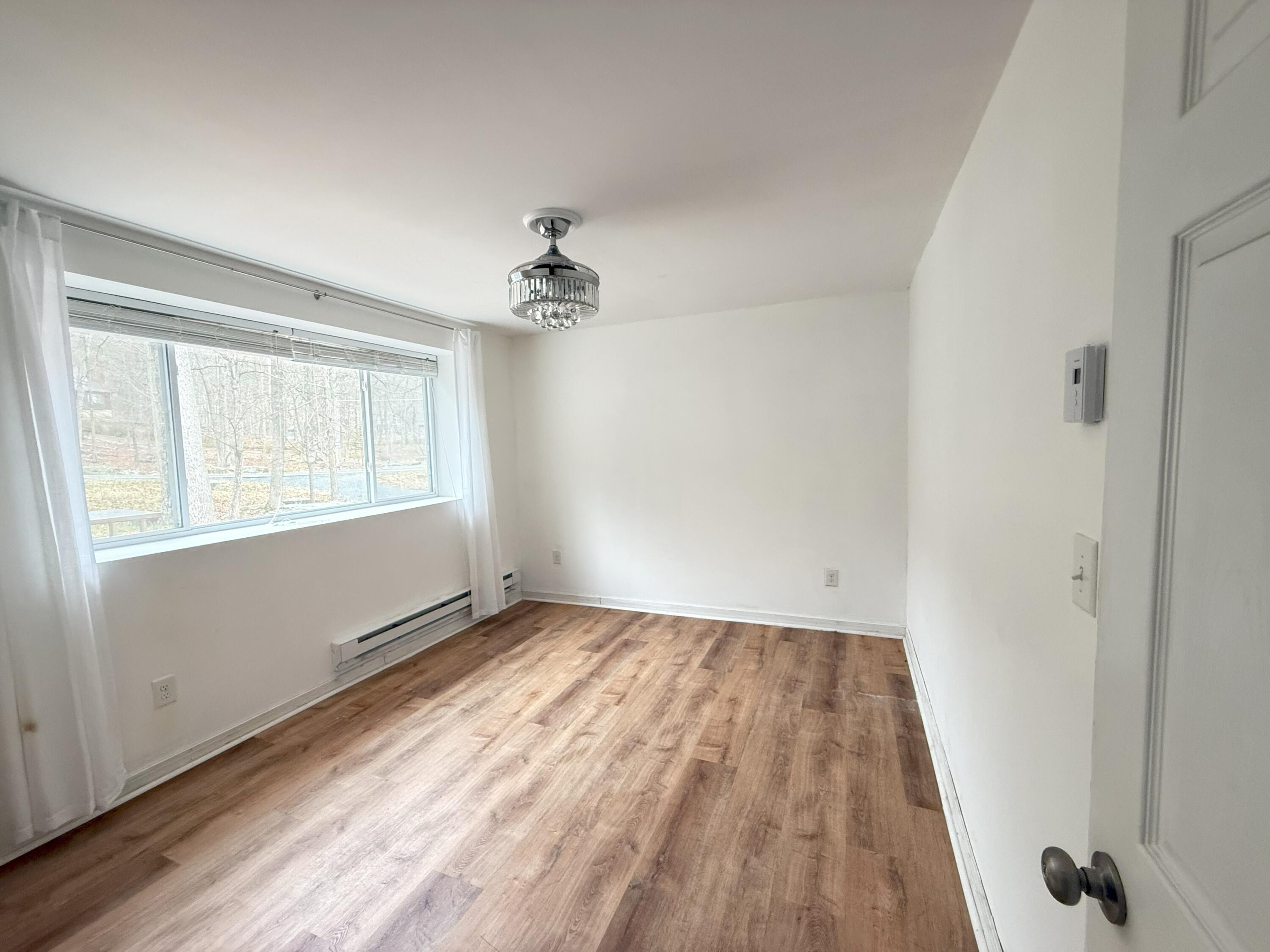 6486 Decker Road Bushkill, PA 18324 - Photo 21 of 53 a view of an empty room with a window