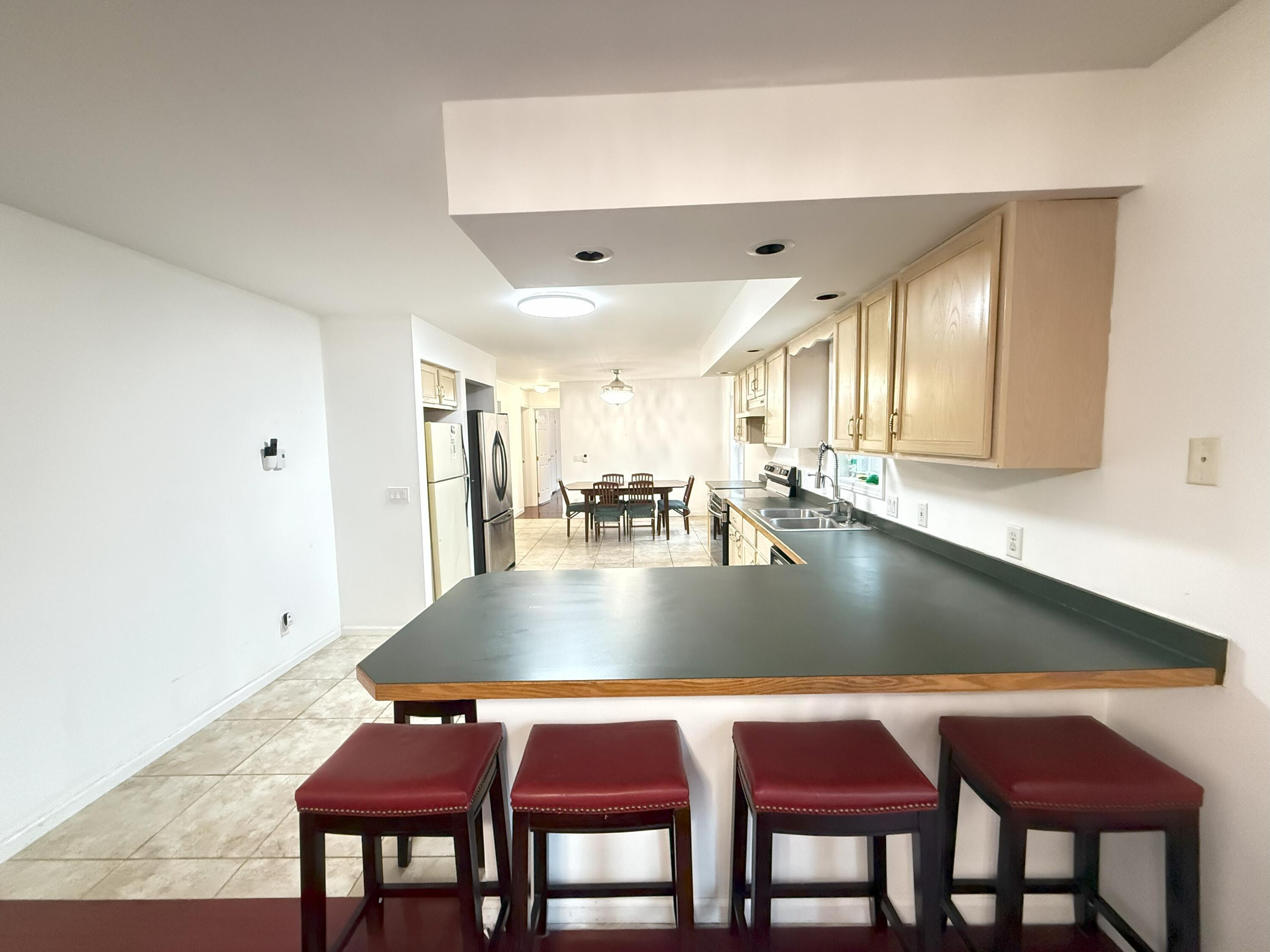 6486 Decker Road Bushkill, PA 18324 - Photo 7 of 53 a view of a dining room with furniture and wooden floor