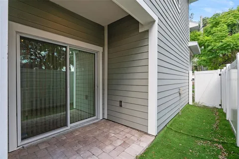 a view of a door and a window