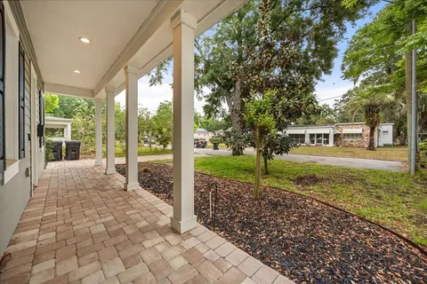 a house view with a backyard space
