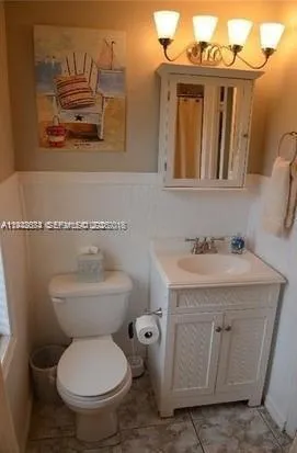 a view of a dining room with furniture and window