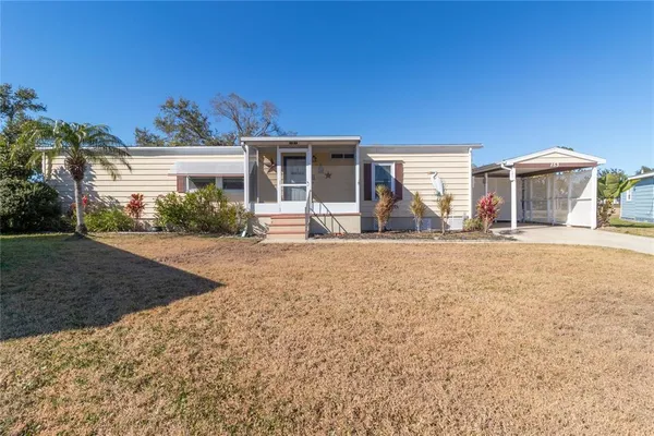front view of a house with a yard