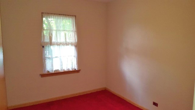 7620 West 25th Street North Riverside, IL 60546 - Photo 29 of 33 an empty room with a window