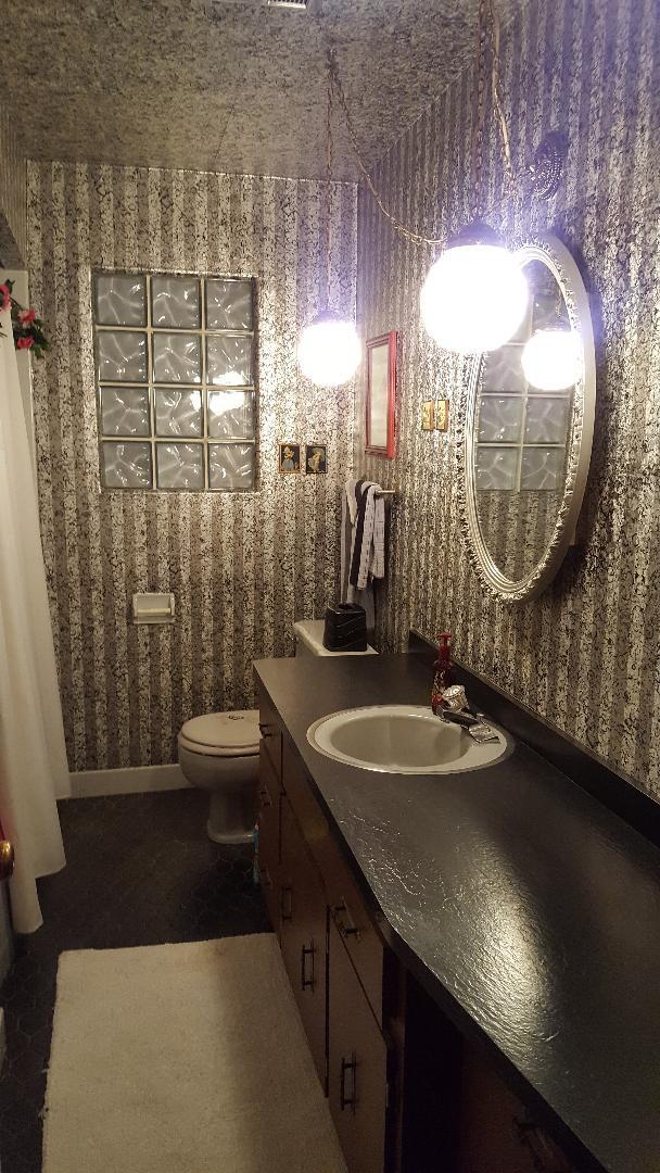 7620 West 25th Street North Riverside, IL 60546 - Photo 30 of 33 a bathroom with a sink a toilet and a shower