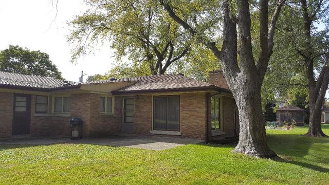 7620 West 25th Street North Riverside, IL 60546 - Photo 4 of 33 front view of a house with a yard