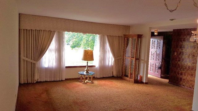 7620 West 25th Street North Riverside, IL 60546 - Photo 10 of 33 a view of an empty room with a window