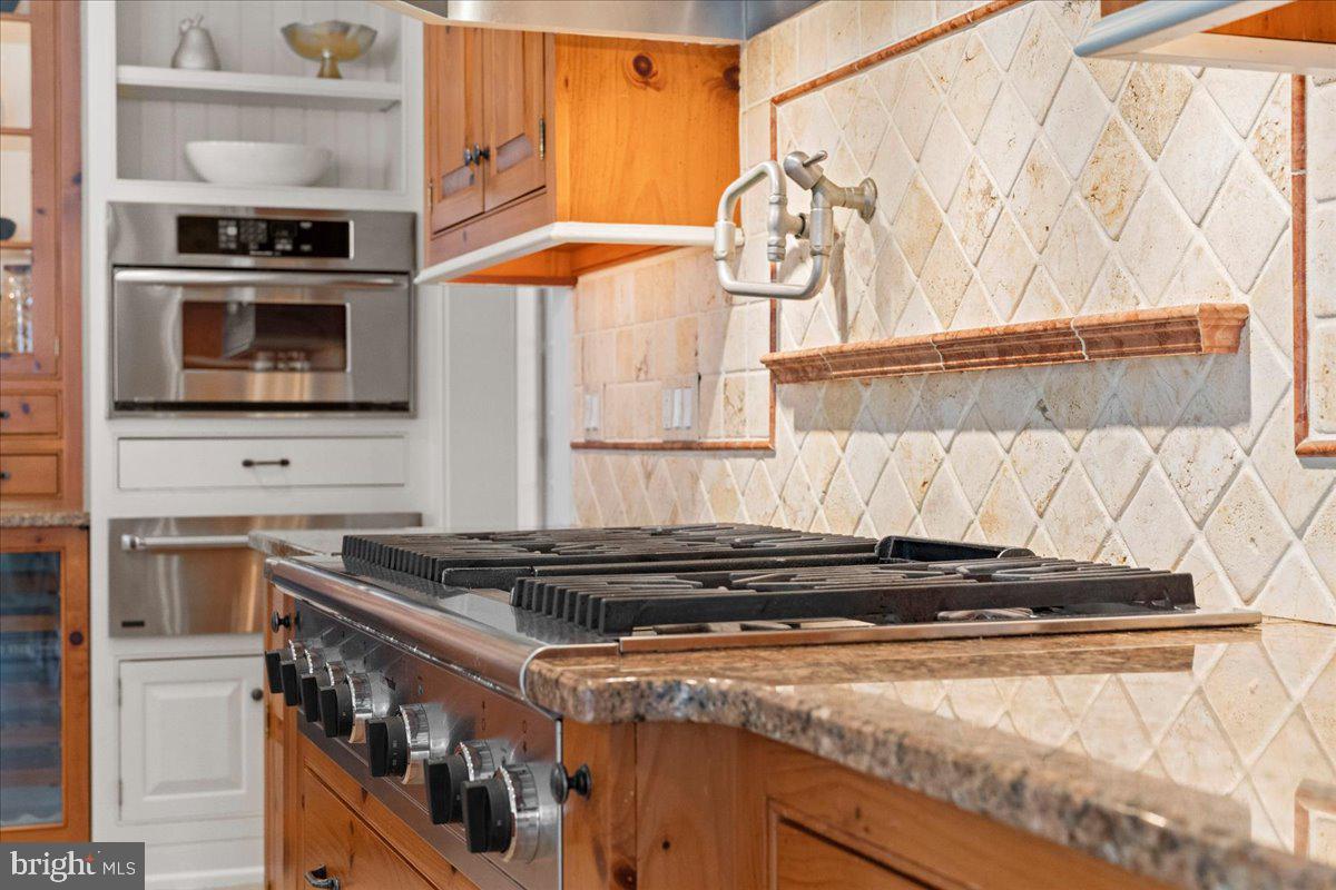 1568 Sacketts Ford Road Ivyland, PA 18974 - Photo 20 of 100 a kitchen with a stove and a microwave