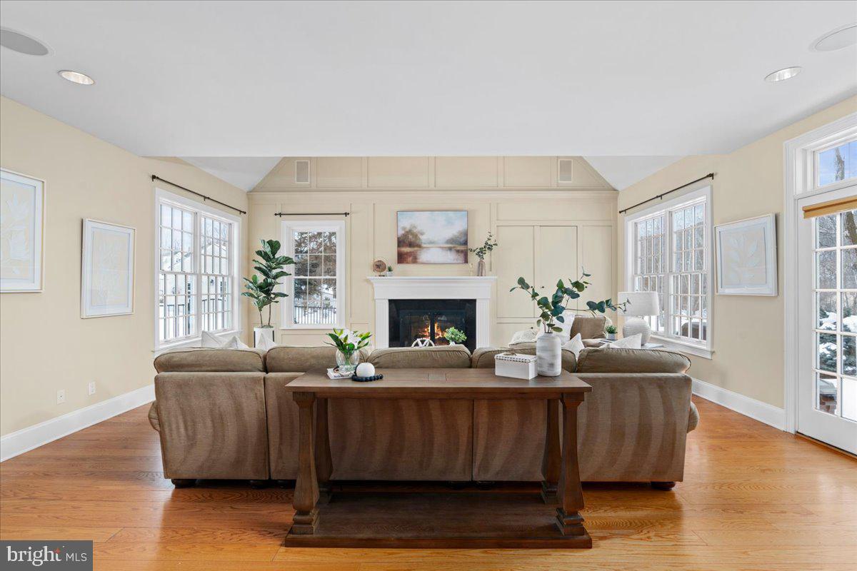 1568 Sacketts Ford Road Ivyland, PA 18974 - Photo 31 of 100 a living room with furniture a fireplace and a window