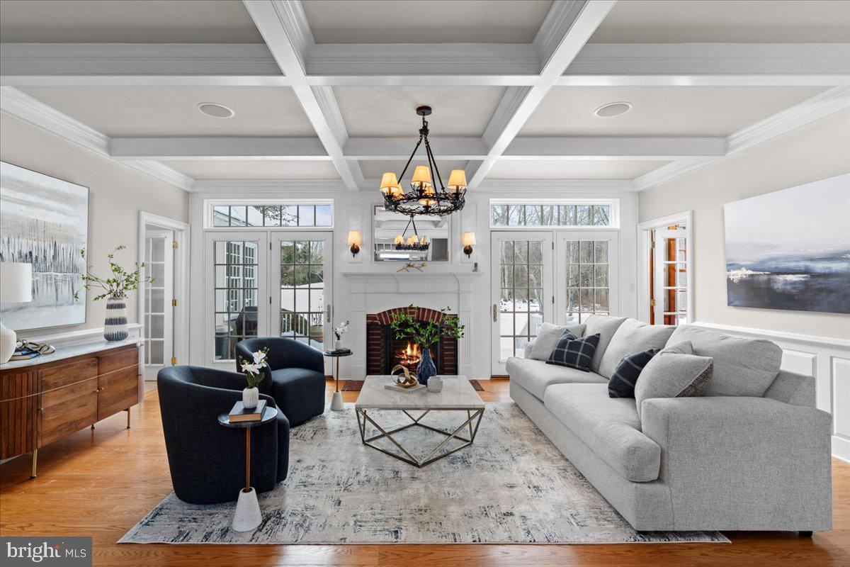1568 Sacketts Ford Road Ivyland, PA 18974 - Photo 5 of 100 a living room with furniture floor to ceiling window and a fireplace