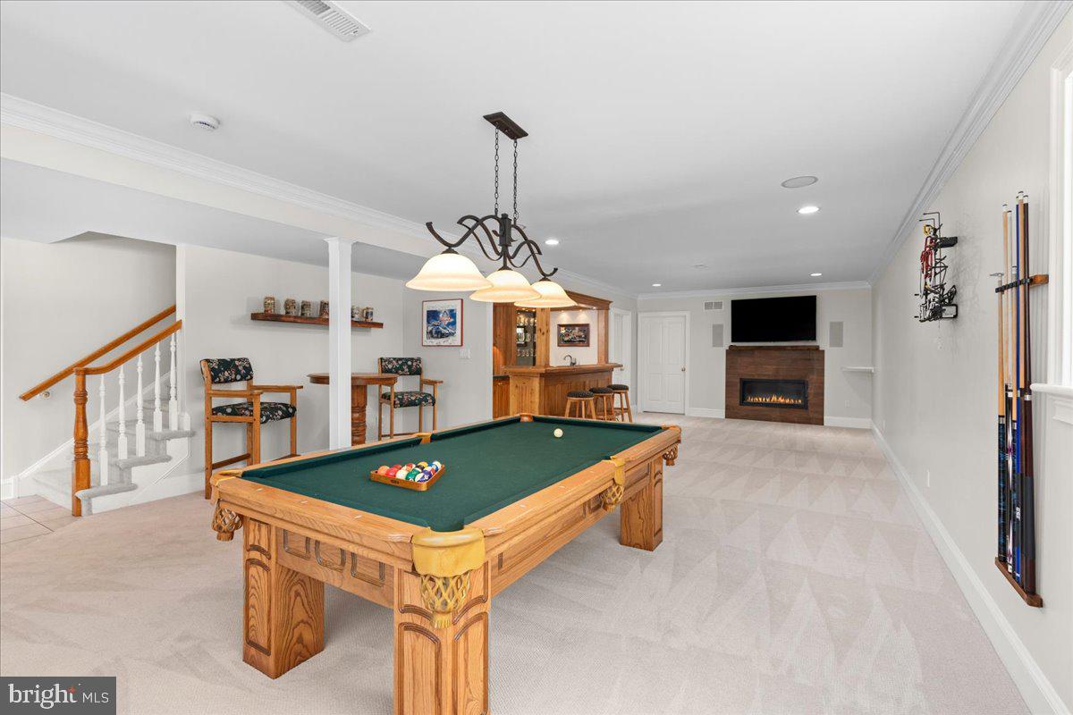 1568 Sacketts Ford Road Ivyland, PA 18974 - Photo 71 of 100 a living room with furniture a flat screen tv and a table
