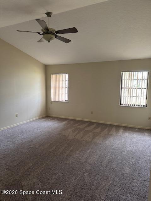 810 Ridge Lake Drive Melbourne, FL 32940 - Photo 14 of 25 a view of a livingroom with a ceiling fan and window