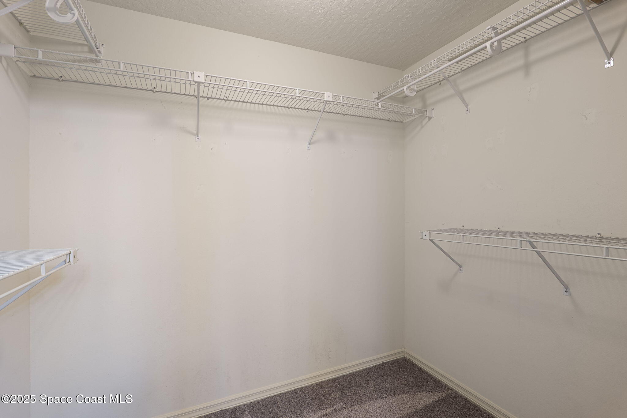 810 Ridge Lake Drive Melbourne, FL 32940 - Photo 15 of 25 a view of a room with racks on the wall