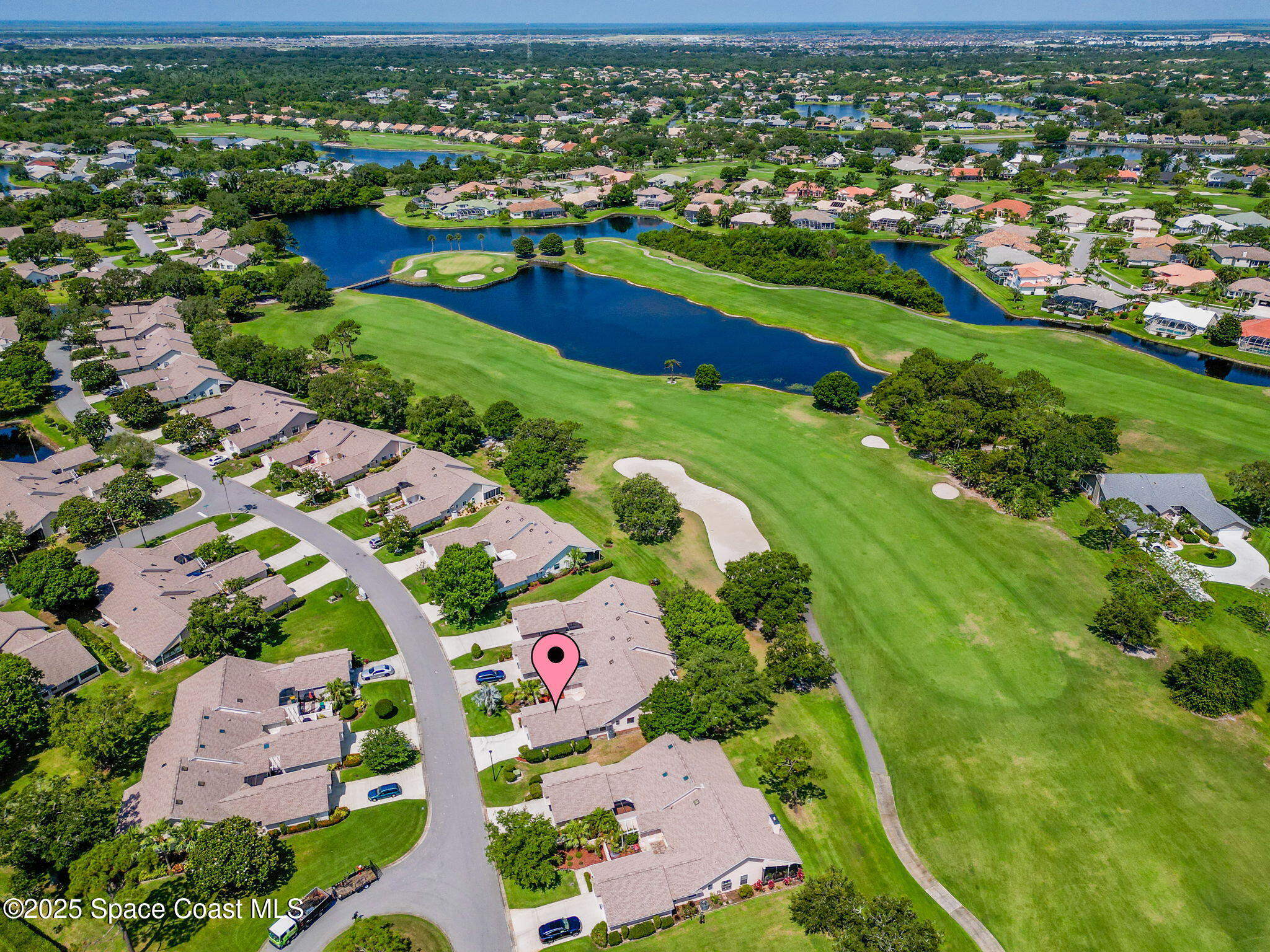 810 Ridge Lake Drive Melbourne, FL 32940 - Photo 2 of 25 an aerial view of multiple house