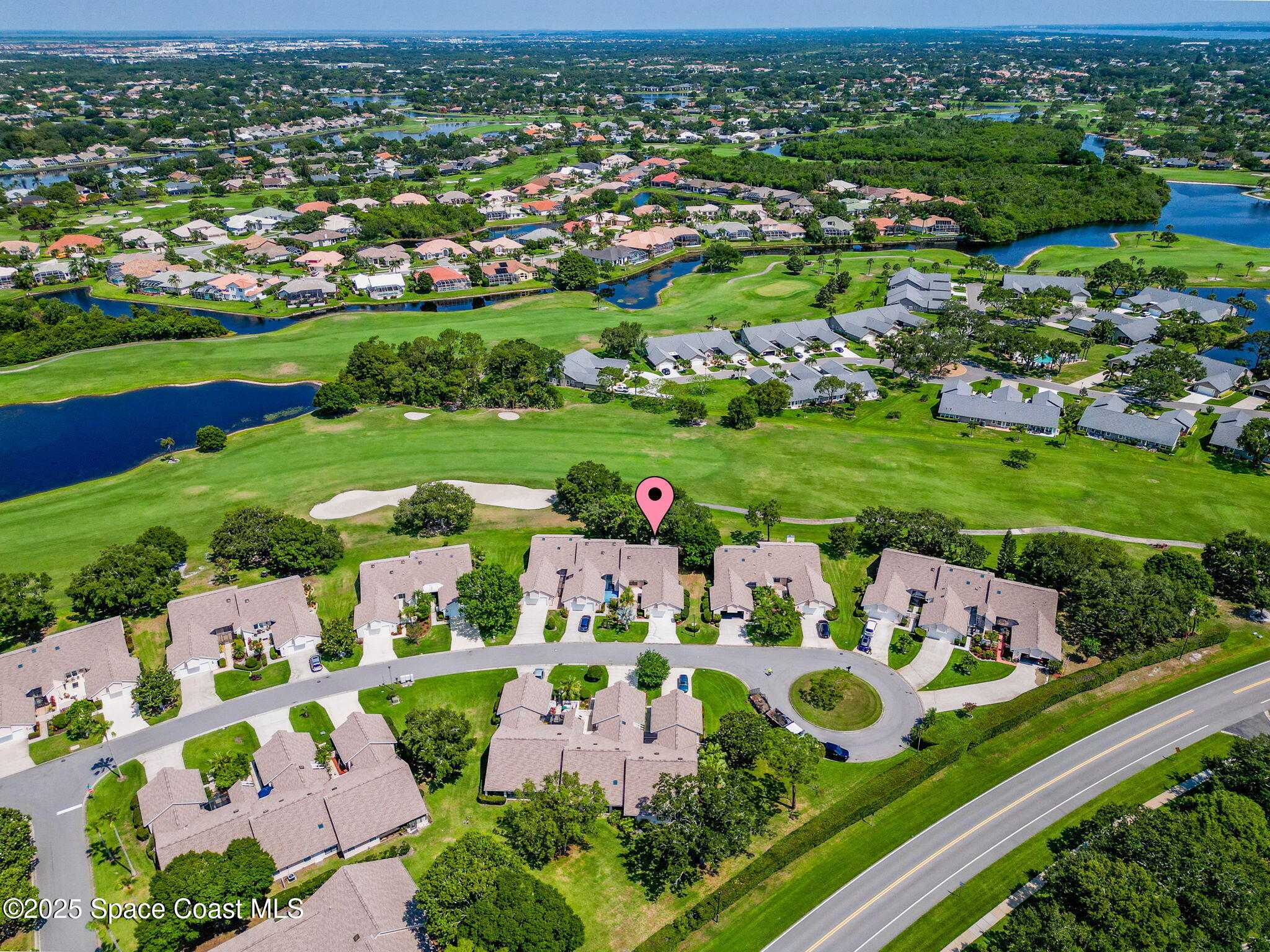 810 Ridge Lake Drive Melbourne, FL 32940 - Photo 23 of 25 an aerial view of a house with a garden