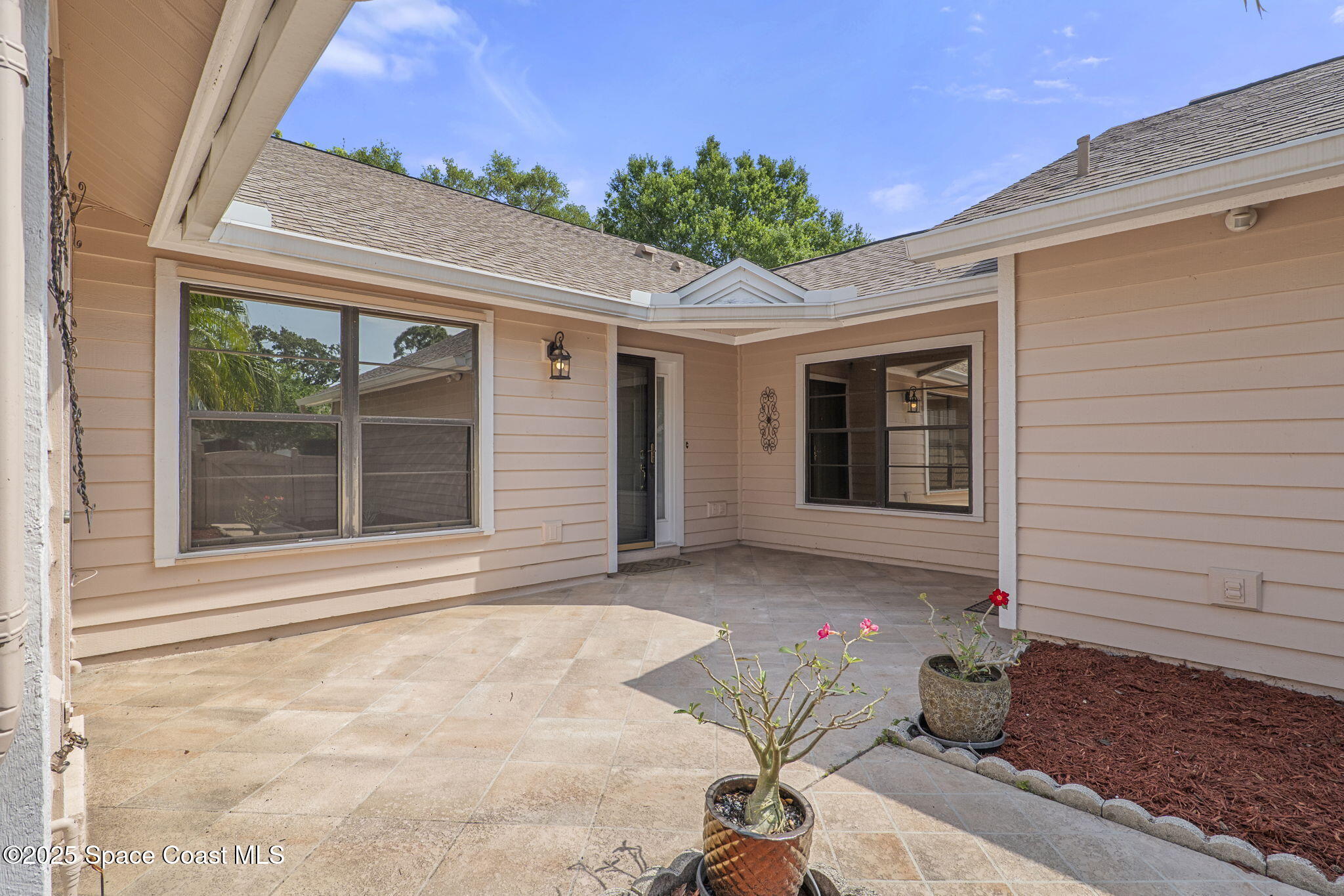810 Ridge Lake Drive Melbourne, FL 32940 - Photo 4 of 25 a view of entrance front of house