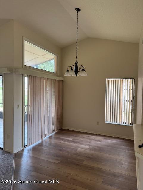 810 Ridge Lake Drive Melbourne, FL 32940 - Photo 6 of 25 a view of an empty room with wooden floor and a window