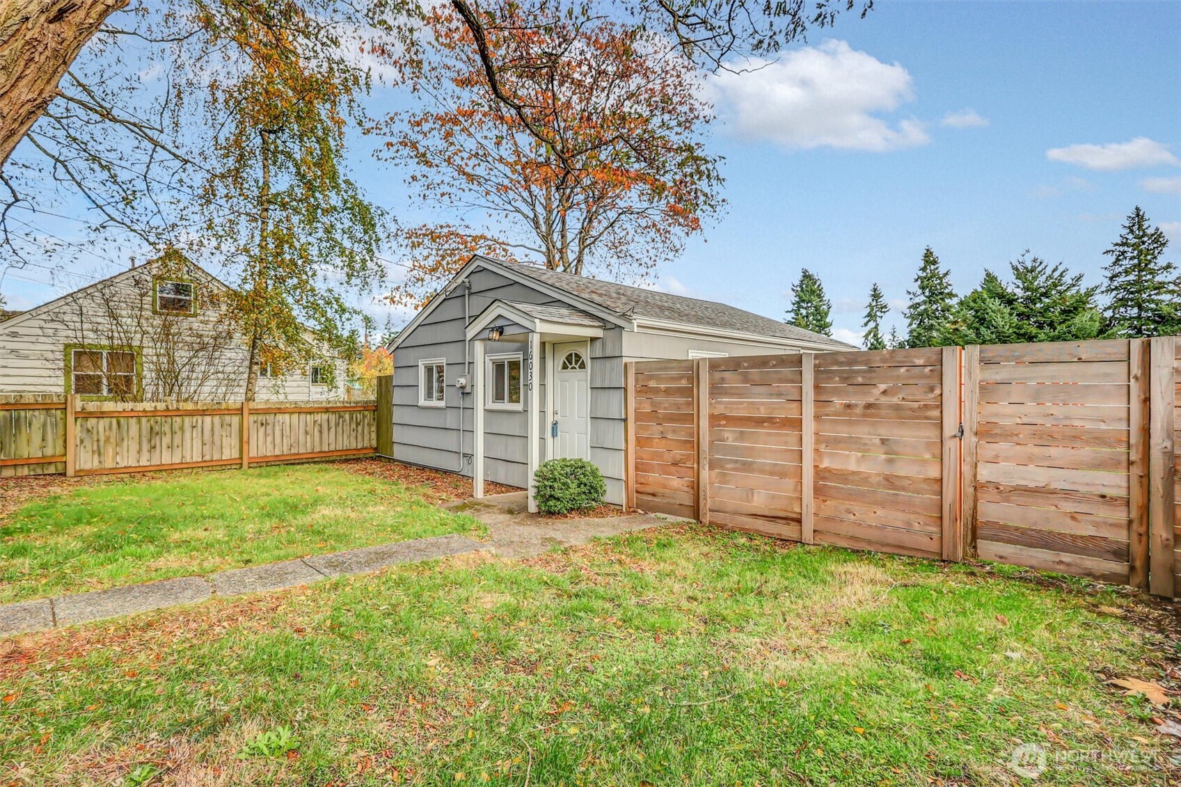 16030 15th Avenue Southwest Burien, WA 98166 - Photo 12 of 19 a view of a house with a yard and sitting area