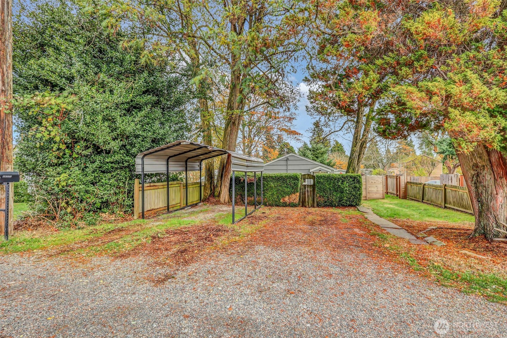16030 15th Avenue Southwest Burien, WA 98166 - Photo 19 of 19 a front view of a house with a yard and trees