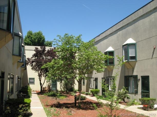 40 South Cherry Street, Unit 23 Wallingford, CT 06492 - Photo 1 of 1 Building 40 Courtyard
