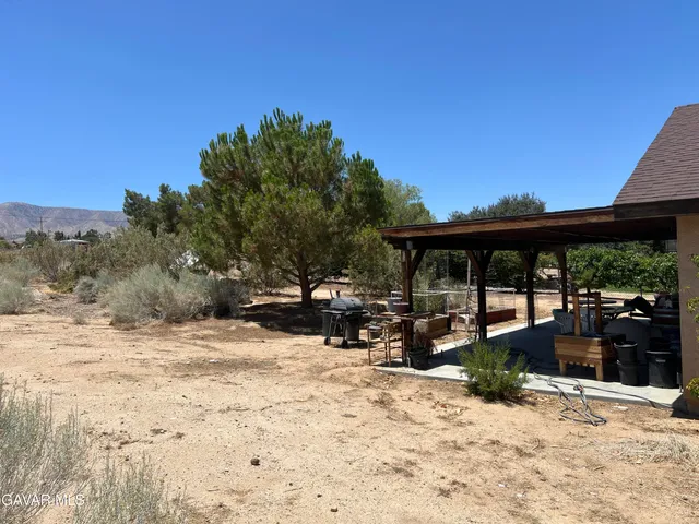 a view of a house with snow on the floor