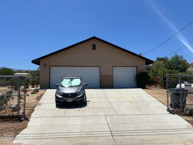 a front view of a house with patio